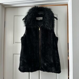 Black faux fur vest